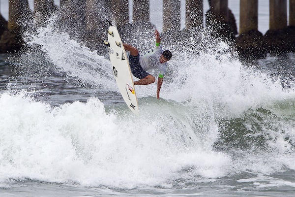 Michel Bourez (PYF), 27, defeated Kelly Slater (USA), 41, securing a Quarterfinals berth at the Vans US Open of Surfing.