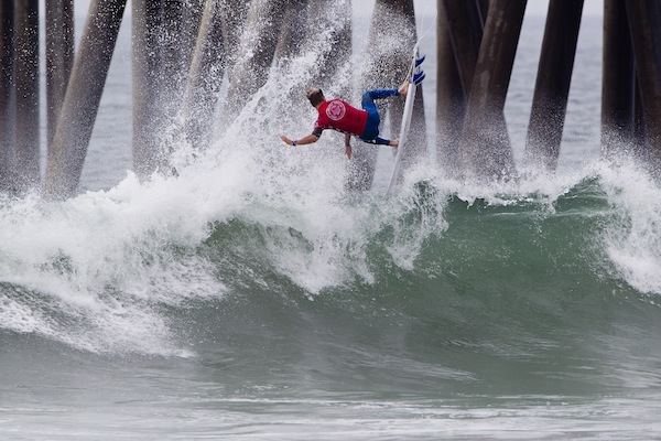 Crews launching a backside air-reverse at the Vans US Open of surfing this season.